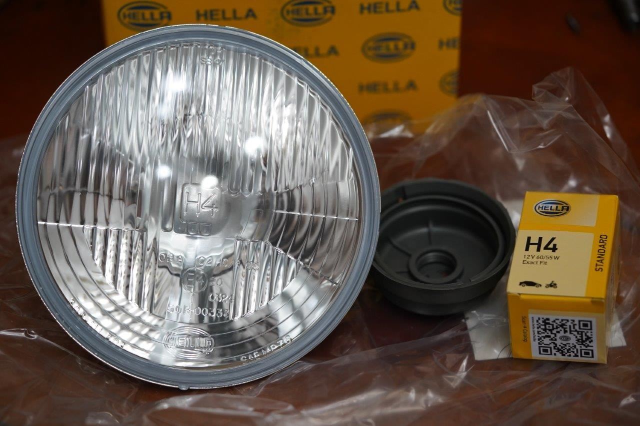 VW NOS. 1A6 002 395-991 H4 Headlight 7 inch ECE